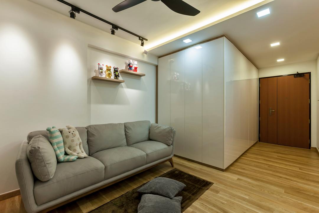 Tampines (Block 870A), Rhiss Interior, Industrial, Living Room, HDB, Grey Sofa, Wood Floor, Black Track Lights, Black Spin Fan, White Long Cabinets, Down Lights, Cove Lights, Couch, Furniture, Indoors, Interior Design