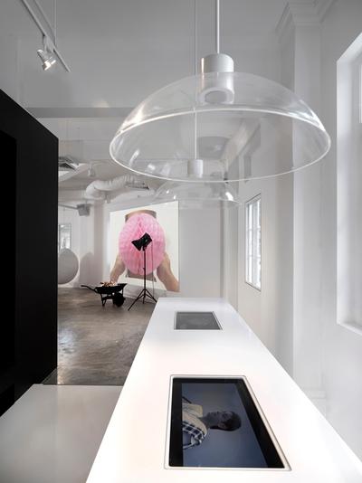 Leo Burnett, Ministry of Design, Eclectic, Commercial, White Counter, White Floor, Concrete Floor, Hanging Light, White Wall, White Ceiling, Ipad