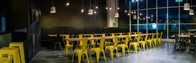 The Burger Shop @ UNITAR, Think Studio, Industrial, Commercial, Dining Table, Dining Chairs, Chairs, Metal Chairs, Steel Chairs, Pendant Light, Pendant Lamp, Long Table, Dark, Stools, Dark Colours, Hanging Lights, Window, Chair, Furniture