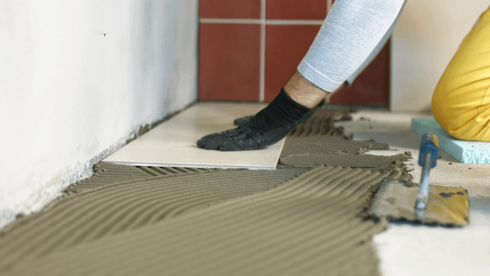 popped tile, cracked tiles issues and tile adhesives Saint Gobain